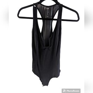 Platinum lingerie body suit metal straps black size L. Sheer in back